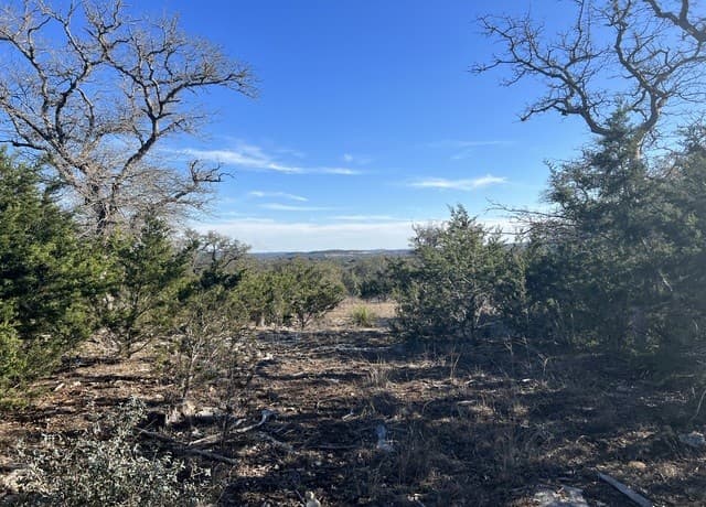 Home for sale at 215 Palomino Springs in Bandera, TX — photo 1