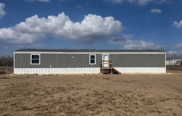 4-bedroom rental at 870 Ave. J in Christine, TX — photo 1