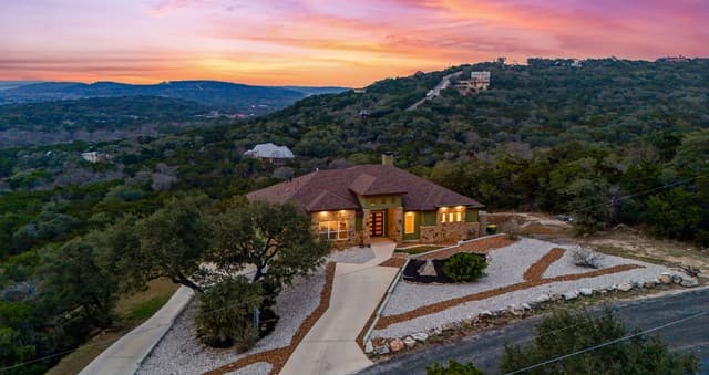 4-bedroom rental at 9889 Cash Mountain in Helotes, TX — photo 1