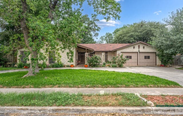 4-bedroom rental at 4503 Pecan Grove in San Antonio, TX — photo 1