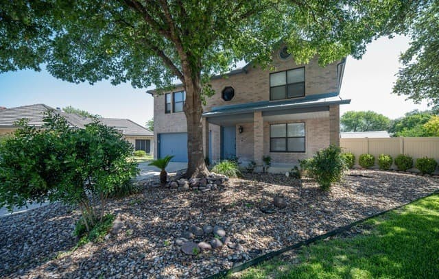 4-bedroom rental at 7422 Ben Crenshaw Ct in San Antonio, TX — photo 1