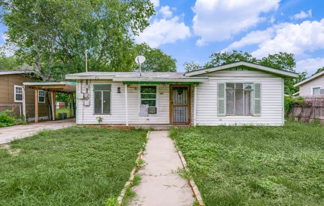 4-bedroom rental at 853 Holmgreen Rd in San Antonio, TX — photo 1