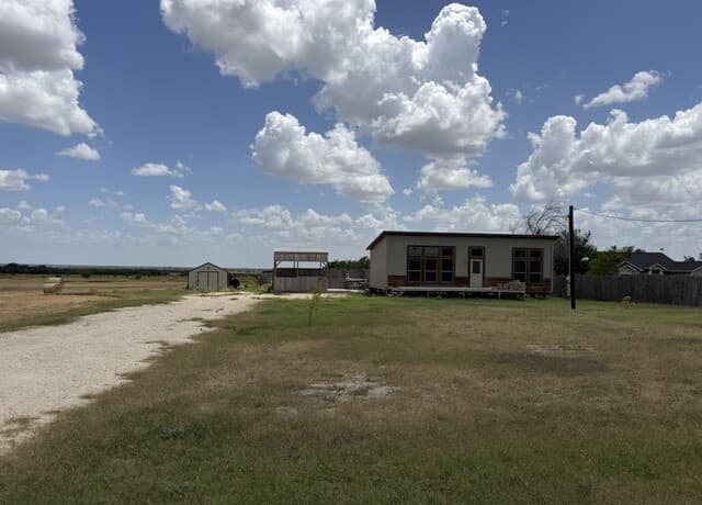 Home for sale at 7002 County Road 4514 in Devine, TX — photo 2